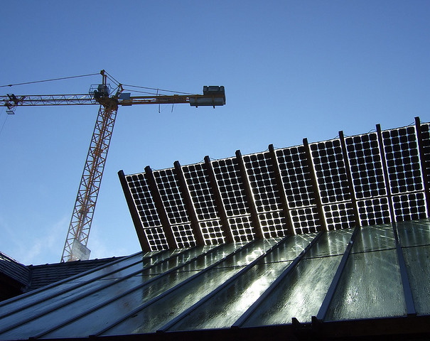 Solar roof with construction crane