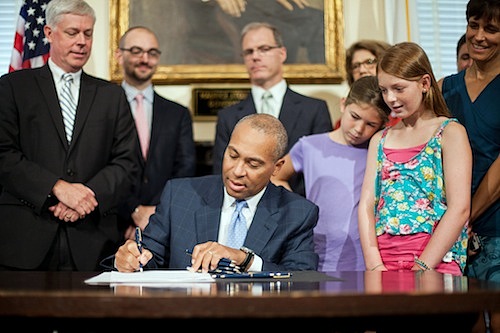Mass. Governor Deval Patrick signs an energy law
