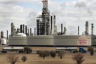 Companies like Exxon should be more forthcoming about climate risks, panel says