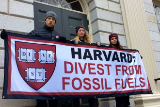 Students blocked the entrance to Harvard's administration building to urge the school to divest from fossil fuels