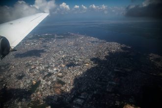 A research aircraft obtains data on pollutants from the sky above Manaus, Brazil