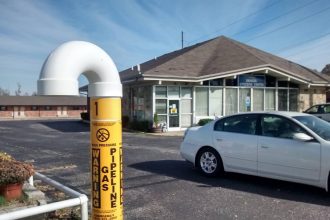 Kinder Morgan natural gas pipeline that was to be repurposed for natural gas liquids runs next to a senior citizens center in Richmond, Kentucky. Credit: Katie Gardner/Courtesy Kentucky Heartwood and Safety on the Line.