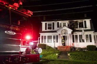 A series of natural gas explosions and fires damaged homes across three Massachusetts communities on Sept. 13, 2018. Credit: Adam Glanzman/Getty Images