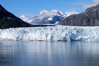 Tidewater glaciers like those seen by millions of tourists in Alaska's Glacier Bay terminate at the ocean, where warming ocean water can expedite melting. Credit: Eric E. Castro/CC-BY-3.0