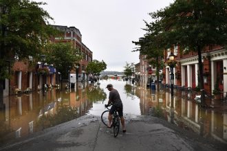 Tidal flooding in Alexandria, Virginia, in 2018. Credit: Matt McClain/The Washington Post via Getty Images