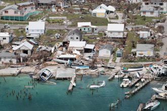 An aerial view of the damage caused by Hurricane Dorian on Great Abaco Island. The storm stalled over that island and Grand Bahama for three days, lashing the communities with powerful wind, heavy rain and dangerous storm surge. Credit: Scott Olson/Getty