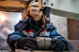 A scientist works with permafrost samples in an underground laboratory of the Melnikov Permafrost Institute in the eastern Siberian city of Yakutsk on Nov. 26, 2018. Credit: Mladen Antonov/AFP via Getty Images