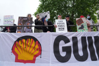 Demonstrators outside Central Hall, Westminster, London, as the petroleum giant Shell are holding its annual general meeting. Picture date: Tuesday May 24, 2022. Credit: Stefan Rousseau/PA Images via Getty Images