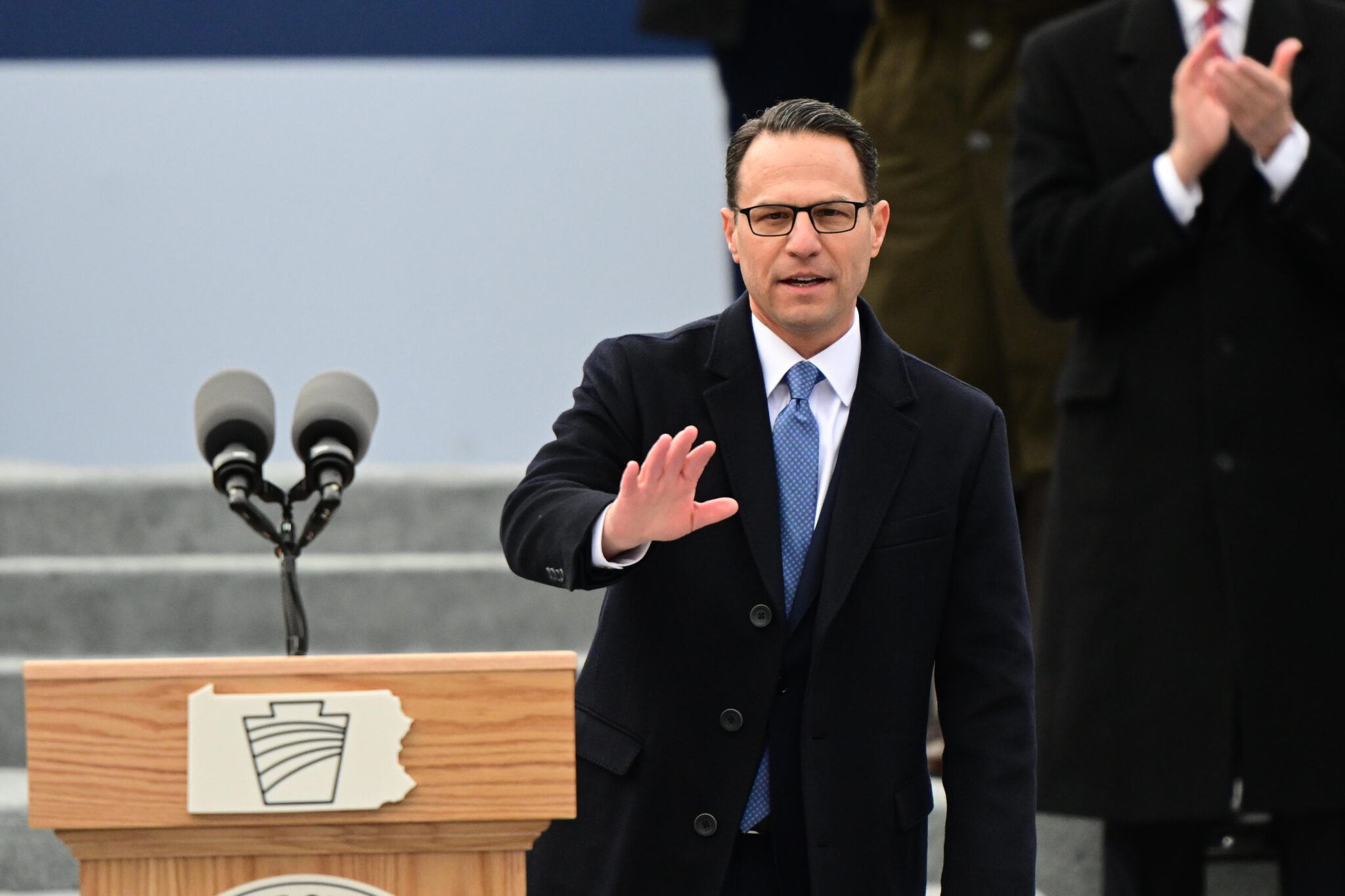 Josh Shapiro waves after speaking at his swearing in as Governor of Pennsylvania at the State Capitol Building on Jan. 17, 2023 in Harrisburg, Pennsylvania. Credit: Mark Makela/Getty Images