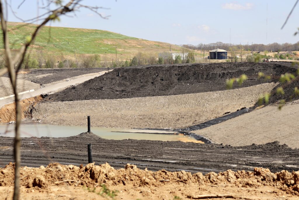 Every day, tons of highly toxic coal ash gets trucked through residential neighborhoods in South Memphis, Tennessee, before being dumped in this landfill. Credit: Adam Mahoney/ Capital B