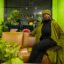 Naomi Davis, an advocate with BlackChicago Water Council, a program of Blacks in Green, sits in the Green Living Room, the Headquarters for Blacks in Green located in the Woodlawn neighborhood, Tuesday, Nov. 9, 2021. Credit: Tyler LaRiviere/Sun-Times