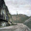The prison fence at the Southeast State Correctional Complex in Floyd County, Kentucky, meets a road and open coal seam. Credit: Jill Frank