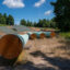 Sections of steel pipe of the Mountain Valley Pipeline lie on wooden blocks on Aug. 31, 2022 in Bent Mountain, Virginia. Credit: Robert Nickelsberg/Getty Images