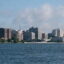 The Wisconsin state capitol rises behind lakeside buildings in Madison, Wisconsin, where the Latino Academy of Workforce Development, a nonprofit aimed at building community through adult education, sponsored a community air monitoring program this summer. Credit: Education Images/Universal Images Group via Getty Images.