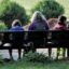 Volunteers on a park bench.