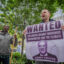 Activists at a protest in New York City, where six people were arrested for blocking the entrance at KKR's headquarters on April 26, 2023.