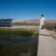 A farmer from Khoshob village walks near his water reservoir near Kandahar airfield, in southern Afghanistan. Credit: Kern Hendricks