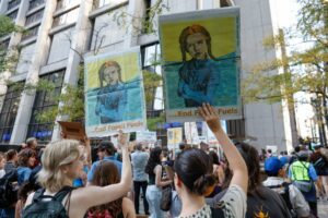Environmental activists march during the Global Climate Strike in downtown Chicago, Illinois, on September 15, 2023. Local groups across the United States are gathering to call for an end to the era of fossil fuels.