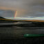 A rainbow touches down on the Kokalik River, in northwestern Alaska, winds its way through the National Petroleum Reserve. Credit: Andrew Lichtenstein/Corbis via Getty Images