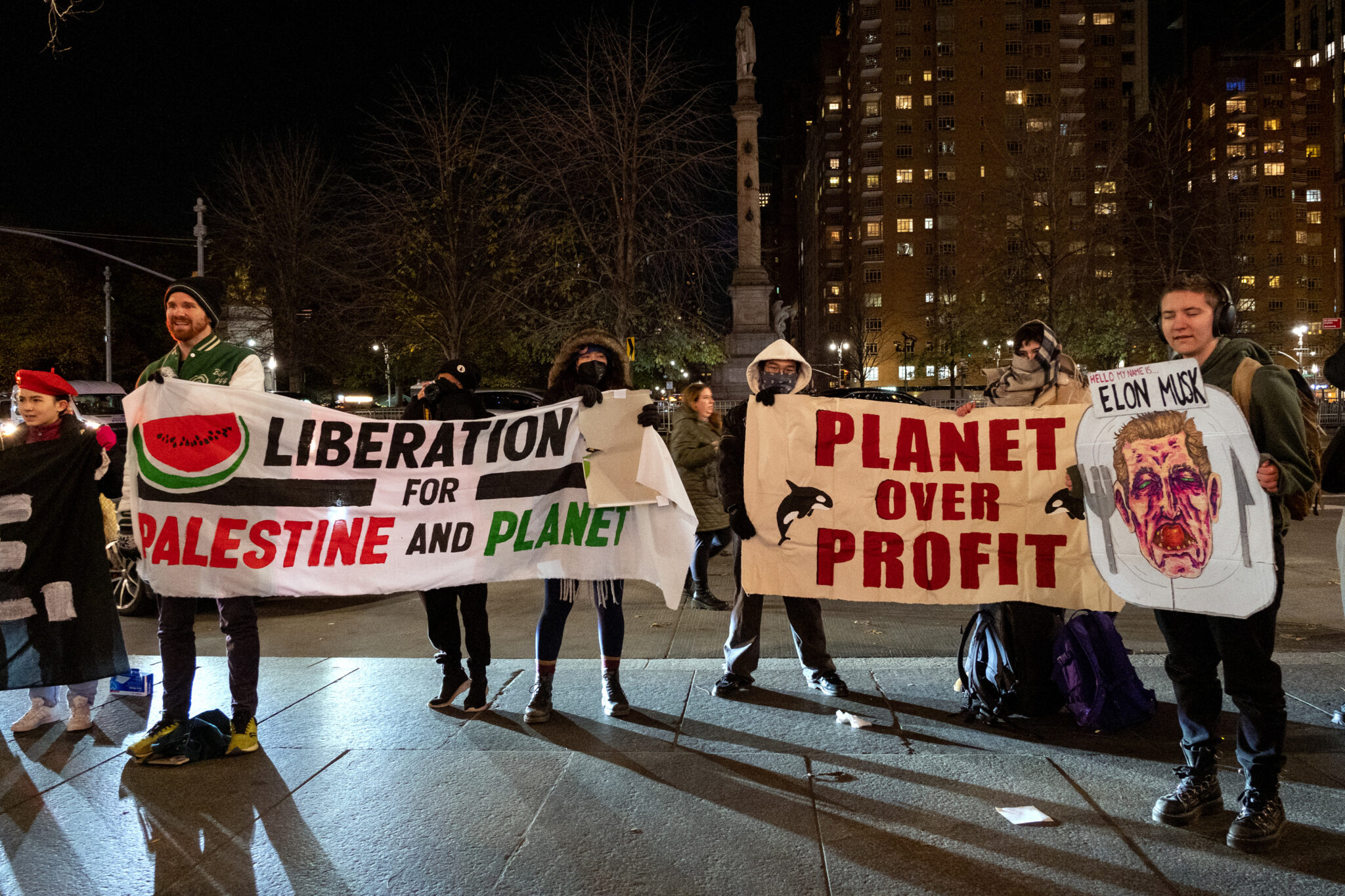 The protesters' signage reflected multiple demands on climate change and the humanitarian crisis in Palestine. Credit: Keerti Gopal/Inside Climate News