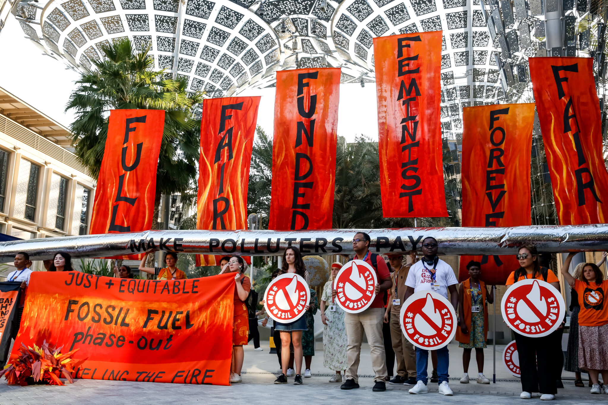 Participants stage a protest calling to phase out fossil fuels during the COP28 climate talks in Dubai. Credit: Dominika Zarzycka/NurPhoto via Getty Images