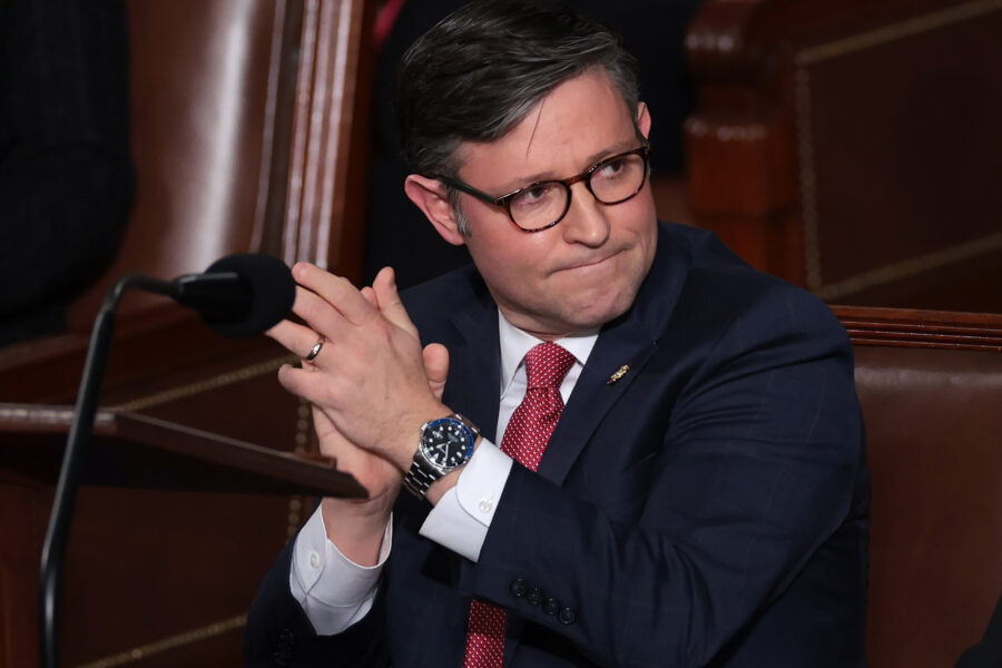 Newly-elected House Speaker Mike Johnson (R-LA) applauds alongside fellow lawmakers during an election for a new Speaker of the House at the U.S. Capitol on October 25. Credit: Win McNamee/Getty Images