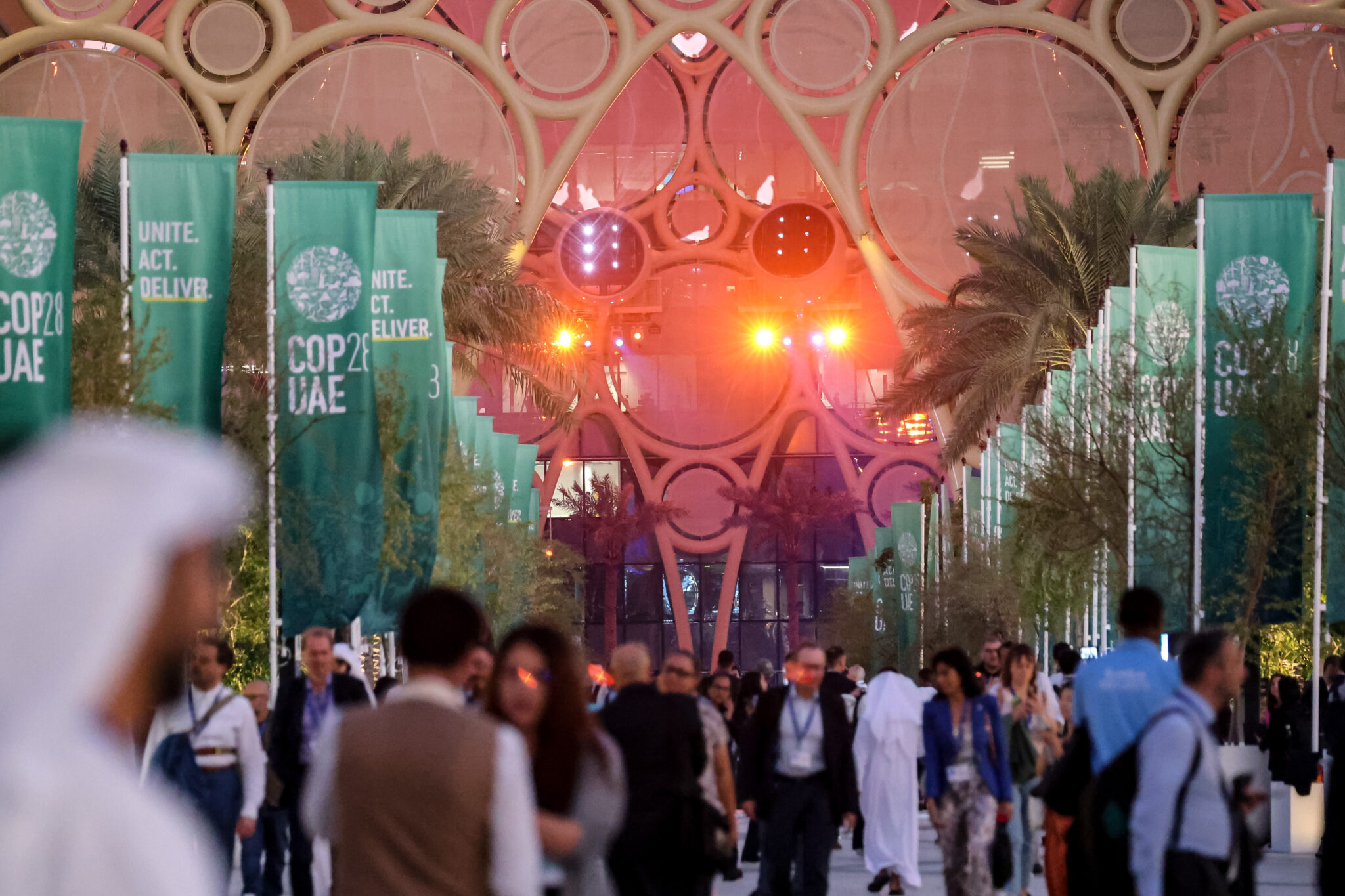 Participants walk in the Blue Zone on Wednesday during the COP28 climate conference in Dubai. Credit: Dominika Zarzycka/NurPhoto via Getty Images