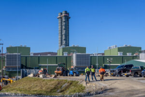 Workers in front of the Cricket Valley Power Plant in Wingdale, New York. Southern Tier Solutions wants to build up to a dozen new natural gas-fueled power plants in the state. Credit: Erik McGregor/LightRocket via Getty Images
