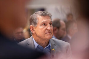 Sen. Joe Manchin waits to be introduced during an event at Saint Anselm College on Jan. 12, 2024 in Manchester, New Hampshire. Credit: Scott Eisen/Getty Images