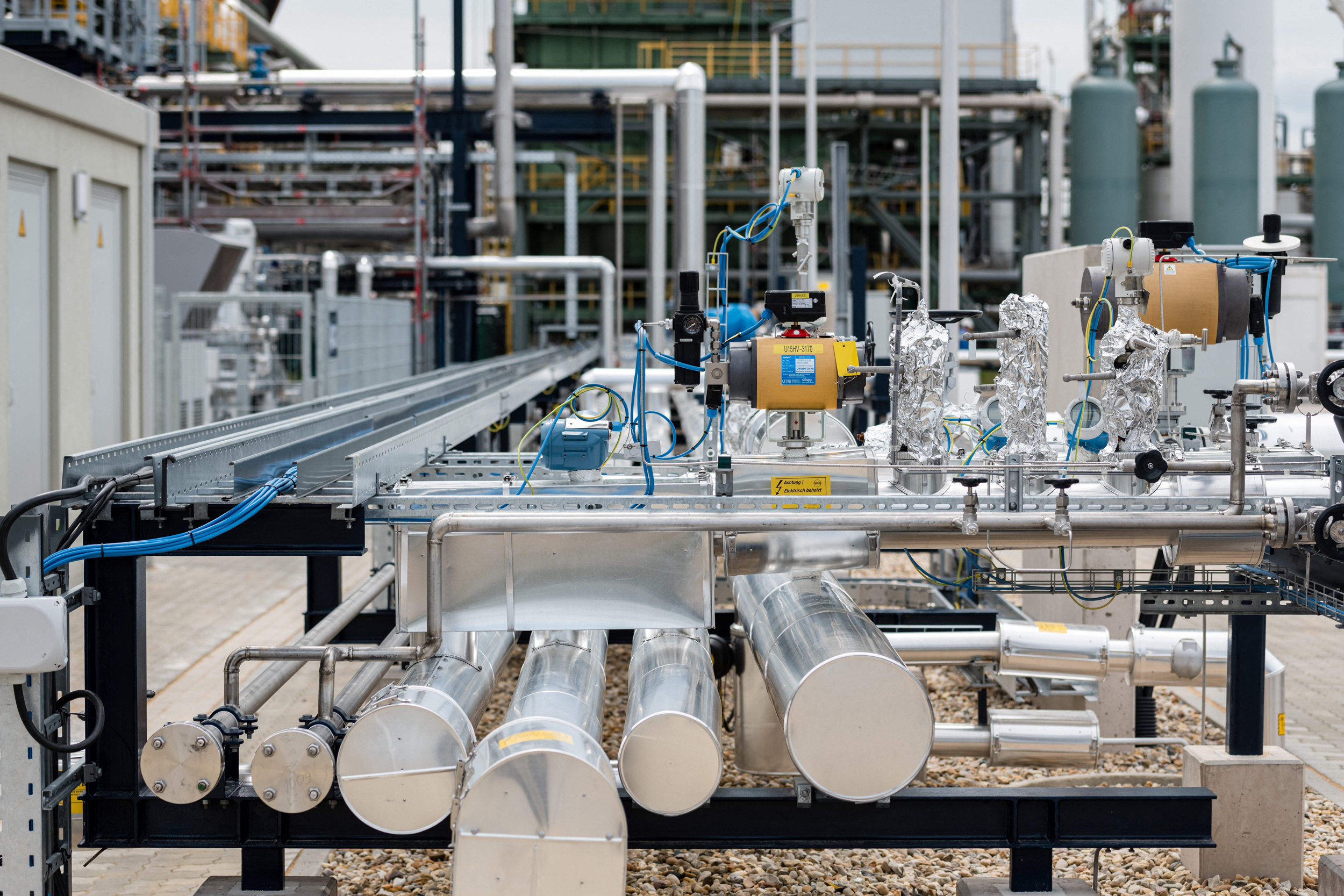 An electrolysis platform for the production of hydrogen is under construction in Leuna, Germany. Credit: Jens Schlueter/AFP via Getty Images