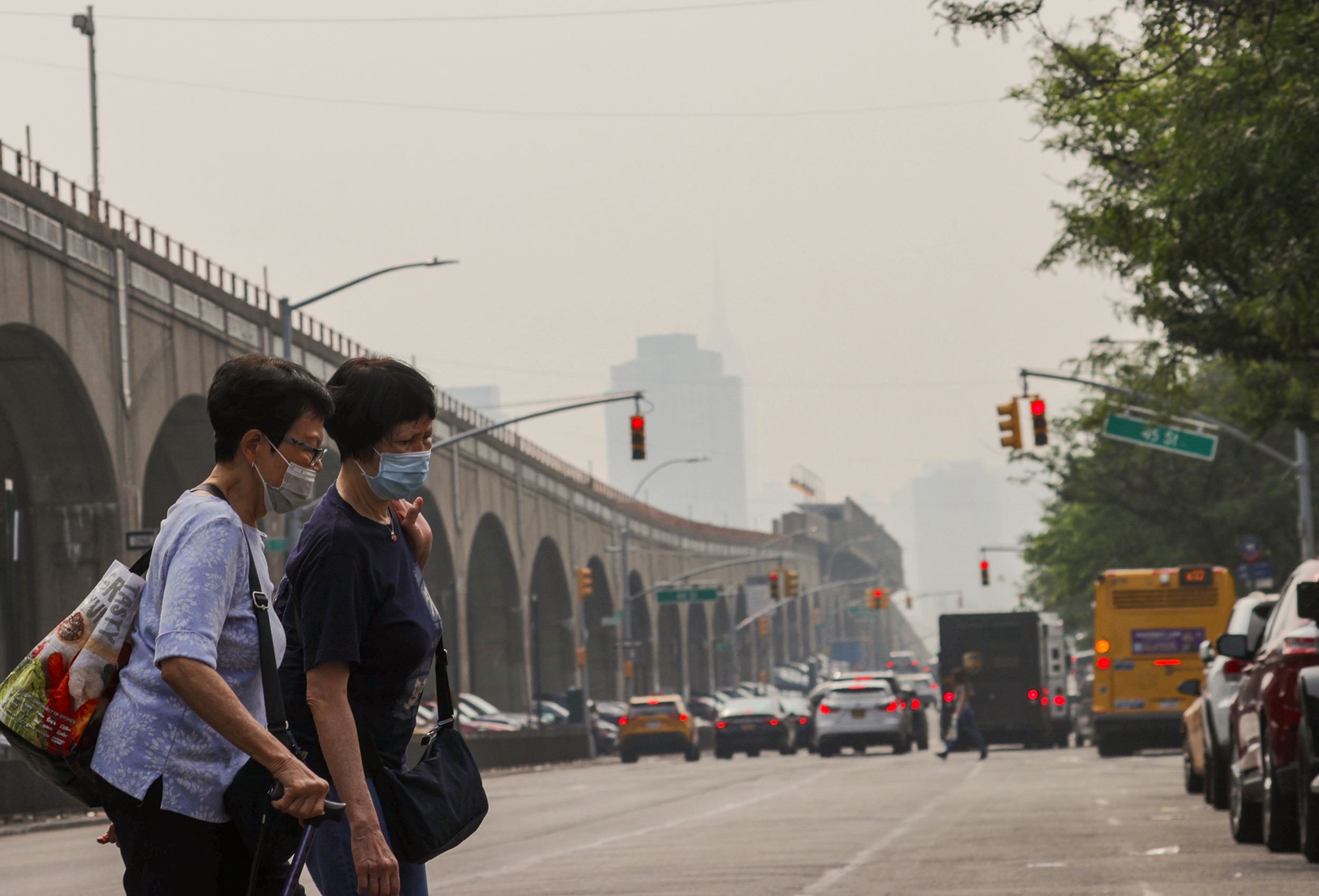 Smoke from wildfires in Canada creates a dangerous haze as the air quality index reaches 160 in New York City on June 30, 2023. Credit: Selcuk Acar/Anadolu Agency via Getty Images