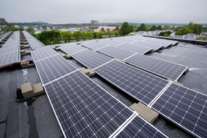 This rooftop houses 167 solar electric panels which supply energy a 45-unit apartment complex in Portland, Maine. Credit: Derek Davis/Portland Portland Press Herald via Getty Images