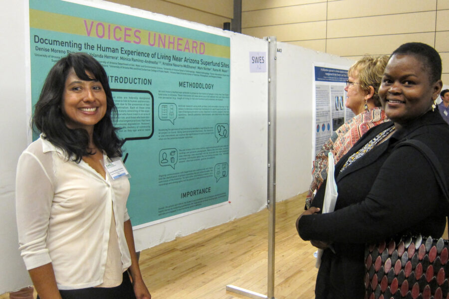 Denise Moreno Ramírez, Ph.D, talks to Dr. Jackie Maximillian about her research poster at the University of Arizona’s Earth Week SWESx Student Showcase where she won second place for her poster presentation in March of 2017. Credit: Courtesy photo