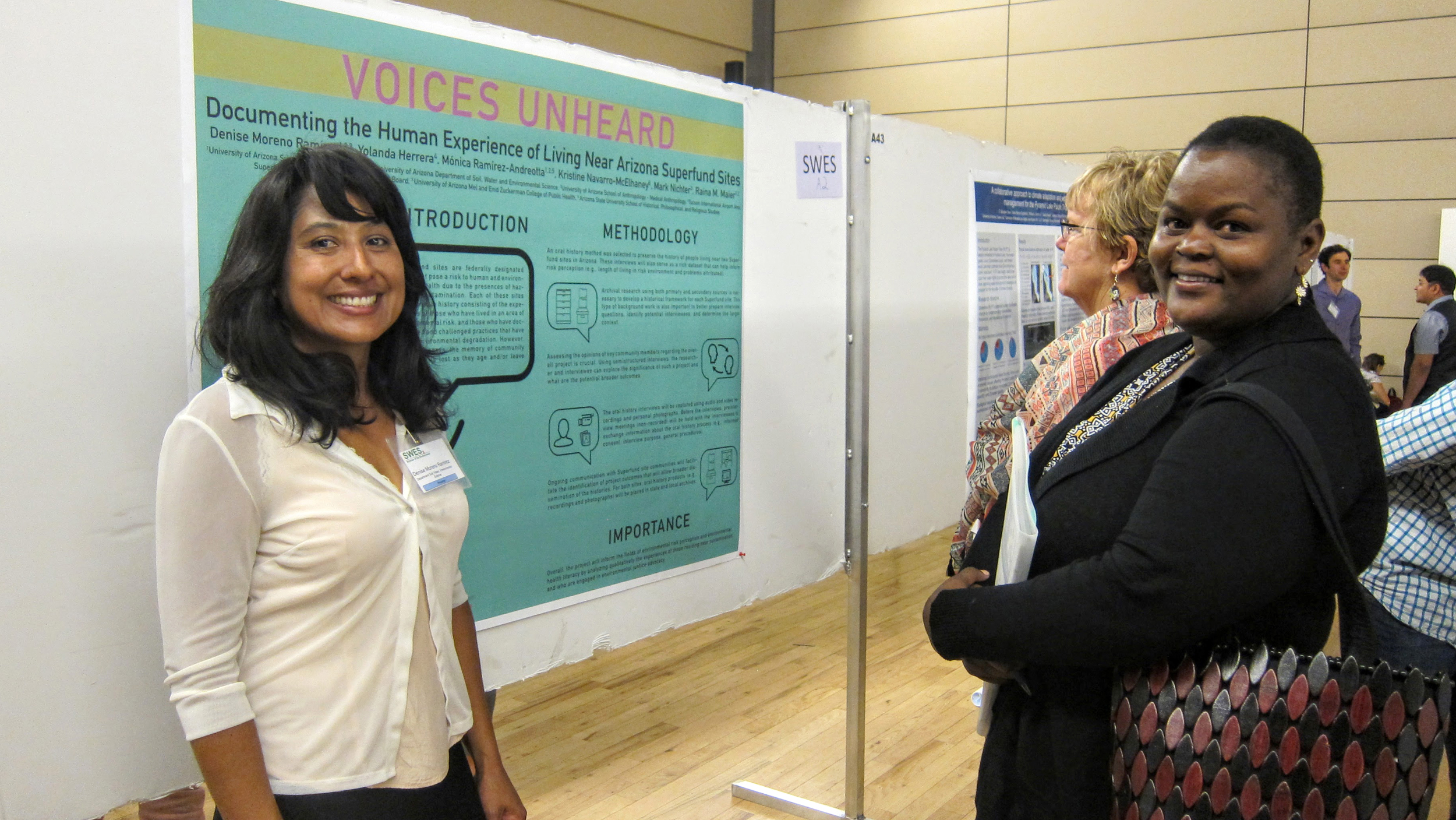Denise Moreno Ramírez, Ph.D, talks to Dr. Jackie Maximillian about her research poster at the University of Arizona’s Earth Week SWESx Student Showcase where she won second place for her poster presentation in March of 2017. Credit: Courtesy photo