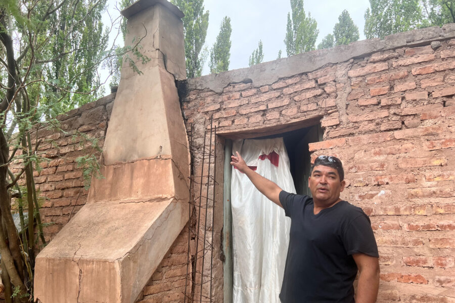 Andres Duran, a Sauzal Bonito resident, points to a crack in his chimney that he says was caused by fracking-induced earthquakes.