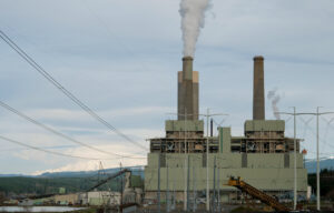 The TransAlta Centralia Generation station pictured on March 8, 2024. Mount Rainer is visible to the left of the plant. Credit: Jeremy Long/WITF