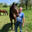 Mark Forrest, Madison County commissioner and owner of a horse boarding business, stands with one of his horses, Pepe. Forrest lost his bid for re-election in the Republican primary in part because of his support for the Oak Run solar project. Credit: Dan Gearino/Inside Climate News