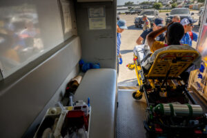 Emergency medical technicians respond to a pregnant woman suffering from dehydration as extreme heat hits the region on July 19, 2023 in Eagle Pass, Texas. Credit: Brandon Bell/Getty Images
