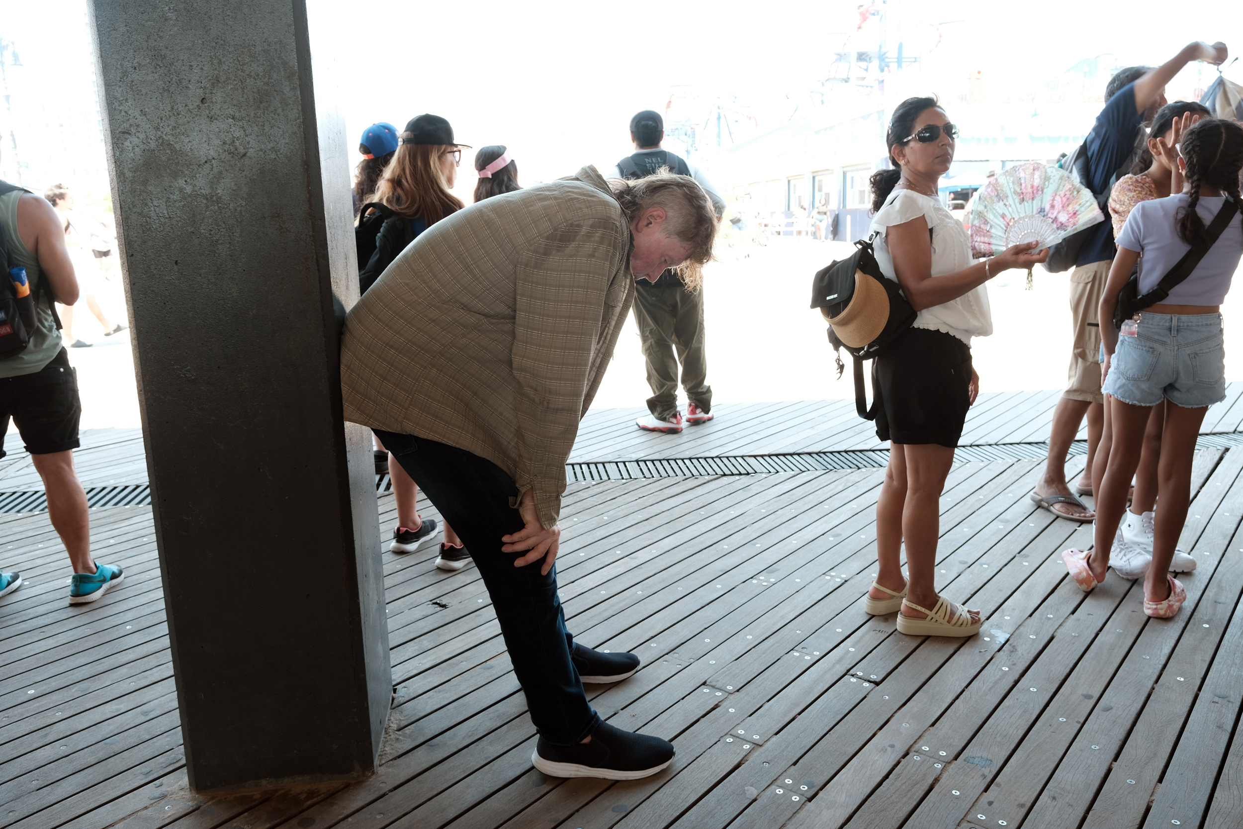 People try to keep cool at Coney Island during a heat wave in New York City on July 28, 2023. Credit: Spencer Platt/Getty Images