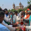 Volunteers distribute cold drinks at a heat wave relief camp on May 31 in Lahore, Pakistan. Credit: Arif Ali/AFP via Getty Images