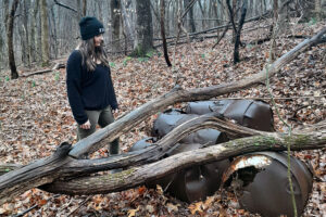 Sam Satterly investigates a hazardous waste dump site known as Gully of the Drums in Jefferson Memorial Forest, a public park in Louisville, Ky. Credit: Courtesy of Sam Satterly