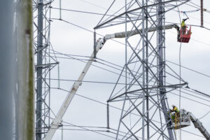 A crew works on transmission lines in Montgomery Village, Md. Credit: Eric Lee/The Washington Post via Getty Images