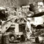 Workers move chemical drums in 1979 to protect a small stream from contamination at the "Valley of the Drums" in Bullitt County, Kentucky. Credit: The Courier-Journal File Photo