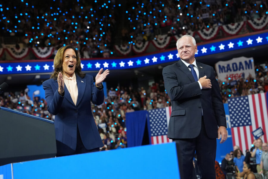 Vice President Kamala Harris and Minnesota Gov. Tim Walz appear on stage together during a campaign event on Tuesday in Philadelphia. Credit: Andrew Harnik/Getty Images