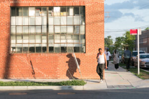 People walk in the Ivy City neighborhood of Washington, D.C. on May 6, 2019. Credit: Lindsay Ferraris/The Washington Post via Getty Images