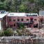 An aerial view of flood damage wrought by Hurricane Helene along the French Broad River on Oct. 3 in Marshall, N.C. Credit: Mario Tama/Getty Images via Grist
