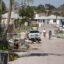 People ride bicycles through storm debris in the aftermath of Hurricane Milton on Thursday in Englewood, Fla. Credit: Sean Rayford/Getty Images