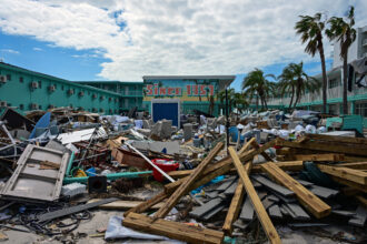 Debris is seen in front of the Thunderbird Beach Resort in the aftermath of Hurricane Milton on Friday in Treasure Island, Fla. Credit: Giorgio Viera/AFP via Getty Images