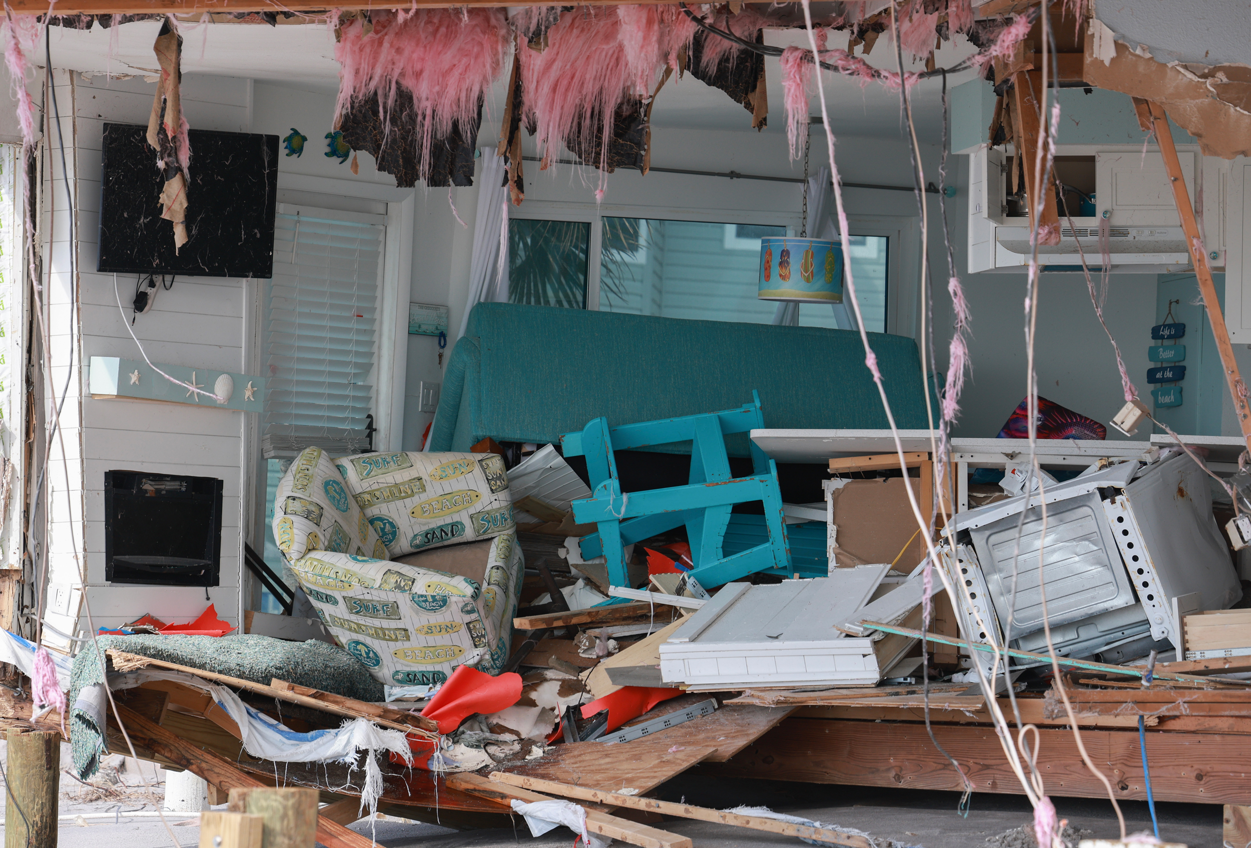 A home that was damaged by Hurricane Milton is seen on Oct. 13 in Manasota Key, Fla. People continue to recover following the storm that made landfall as a Category 3 hurricane in the Siesta Key area on Oct. 9. Credit: Joe Raedle/Getty Images
