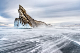 A view of an ice-covered Lake Baikal on Ogoy Island in Siberia, Russia. Credit: Sergey Pesterev/CC BY-SA 2.0